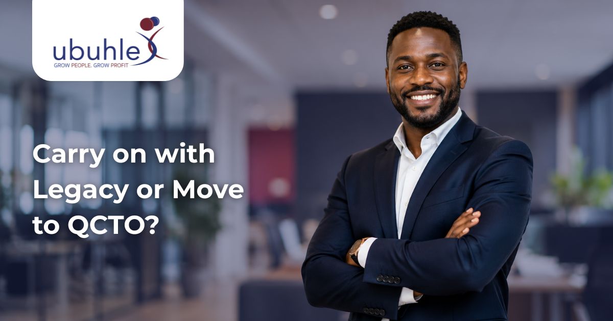 Business professional discussing whether organisations should continue with Legacy learnerships or transition to QCTO occupational qualifications in South Africa.